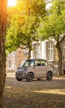 Electric microcar parking 스톡 사진