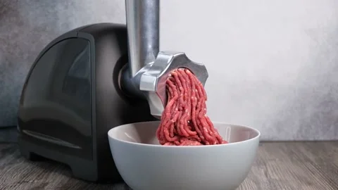 Electric mincer machine makes raw meat minced Stock Footage 143244214