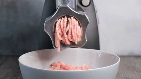 Electric mincer machine makes raw meat minced Stock Footage 143244222