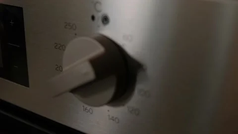 Electric oven handle close-up. Stainless steel handle with oven programs. Stock Footage 151863009