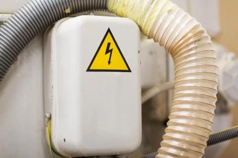 Electric panel with caution sign Foto stock