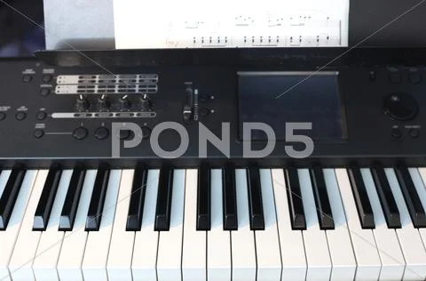 Electric piano front Stock Photos
