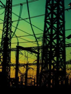 Electric pillars in sunset Stock Photos