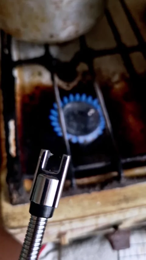 Electric Plasma Arc Lighter Activating Near Gas Stove Stock Footage 322533744