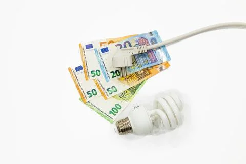 Electric plug, light bulb, and the euro money banknotes. Concept of expensive Stock Photos