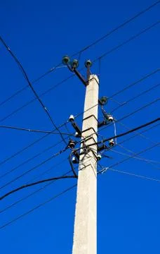 Electric pole on the background of the sky Foto stock