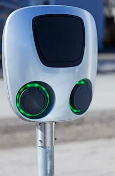 Electric pole to be able to charge two cars at the same time Stock Photos