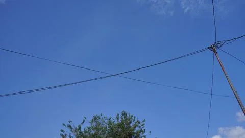 An electric pole with cables on top, Foto stock