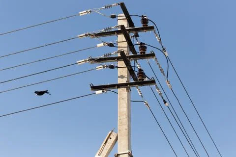 Electric pole on the sky background Stock Photos