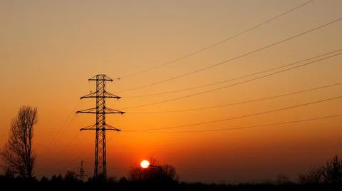 Electric pole at sunset Stock Photos