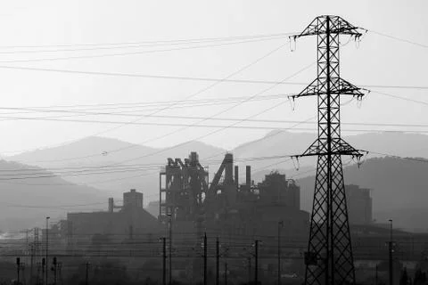 Electric pole towers backlight Stock Photos