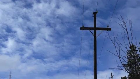 Electric poles on the background of clouds.Time-Lapse  Stock Footage 194049722
