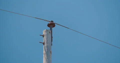 Electric post / Isolator closeup 1 Stock Footage 130915539