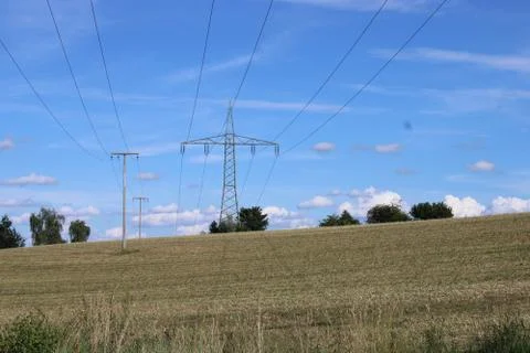 Electric posts in the nature. Stock Photos
