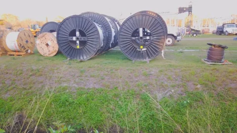 Electric Power Cable Rolls Jumbo Substation at Sunset Stock Footage 234201742