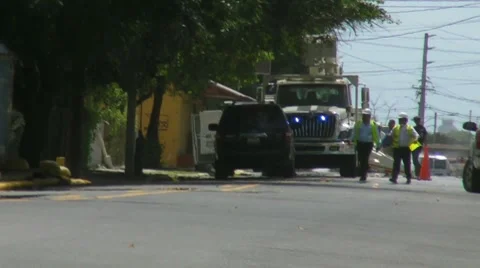 Electric Power Lines Engineers and street electrical repair work Stock Footage 7903219
