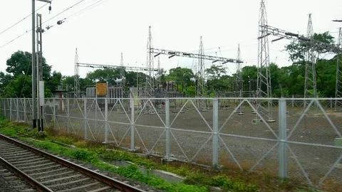 Electric power Sub Station view From Moving Indian Train, Rural Forest Village Stock Footage 155117278