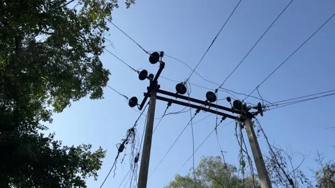 Electric Power Transformer on Utility Pole with Overhead Distribution Lines Stock-Footage 325064435