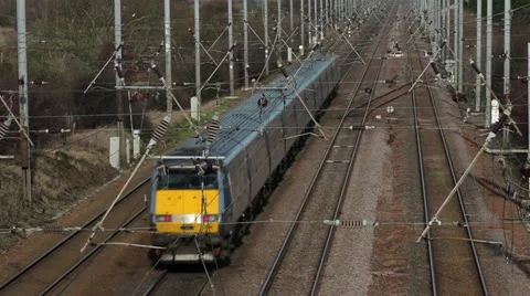 Electric powered train on track Stock Footage 21034577