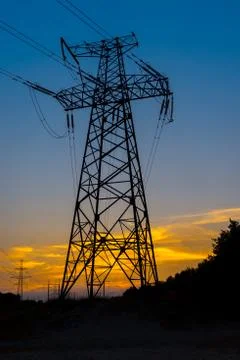 Electric pylon at sunset 写真素材
