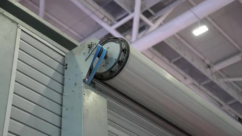 Electric roller shutter of factory warehouse Stock Footage 297721874