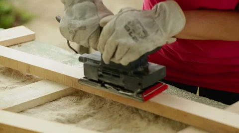 Electric sanding machine in action - sanding wooden planks Stock Footage 41832298