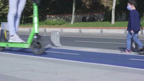 Electric scooter on bicycle path Stock Footage 142876582