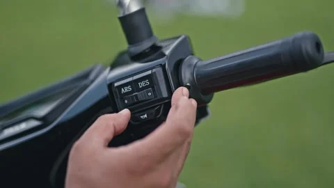 Electric Scooter Power Switch On and Off Close-Up Stock Footage 334373633