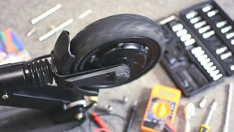 Electric scooter repair. The engine is not working properly. Motor defect. Stock Footage 139332012