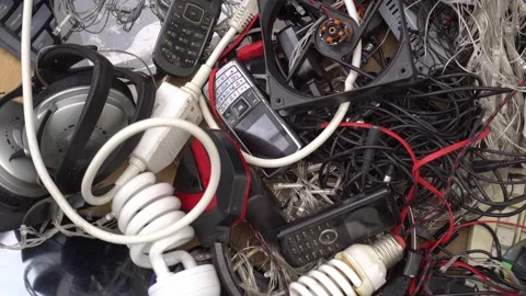 Electric scrap e-waste. Old wares, outdated mobile phones, non-working Stock Footage 171908497