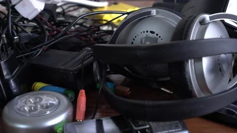 Electric scrap - old wires, outdated mobile phones, non-working devices Stock Footage 148251812