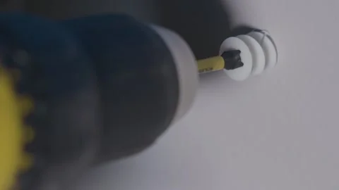 Electric Screw Driver Drilling Into Wall Close Up Slow Motion Stock Footage 144904900