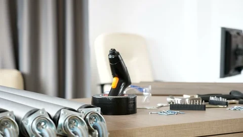 Electric screwdriver on a table with equipment Stock Footage 89289846