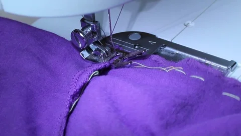 Electric sewing machine - sewing fabric (closeup 1) Stock Footage 78360076