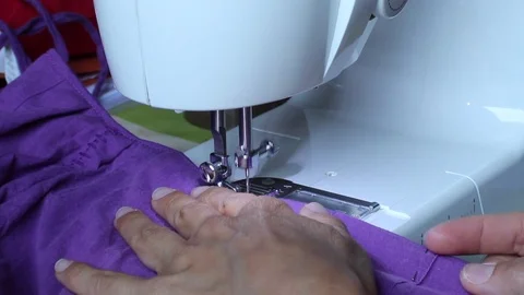 Electric sewing machine - sewing fabric Video stock 78409345