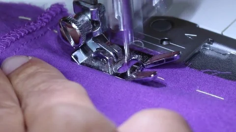 Electric sewing machine - sewing fabric (ext.closeup 2, audio) Stock Footage 78418879