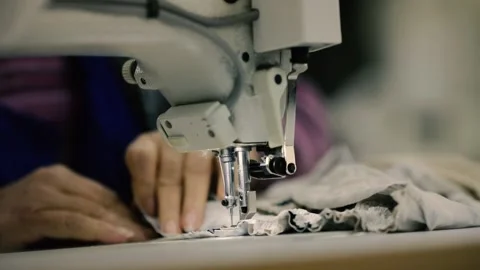 Electric sewing machine in a textile factory. Stock Footage 150989550