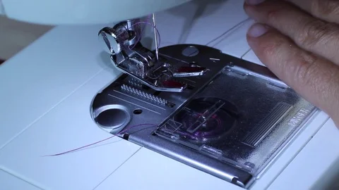 Electric sewing machine - threading the needle Video stock 78359163