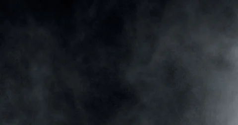 An electric sky churns with storm clouds and drifting smoke as bright lightning Stock Footage 322734579