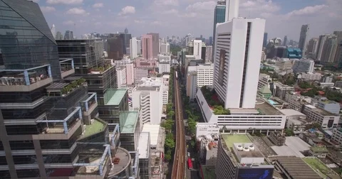 Electric Sky Train On Silom Road In Bangkok, Thailand, Aerial Slider Shot Stock Footage 79904586