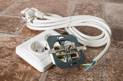 Electric socket and cable, close-up Stock Photos