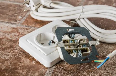 Electric socket and cable, close-up Stock Photos