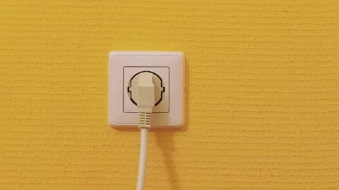 Electric Socket Plugging in Appliance Stock Footage 140938523