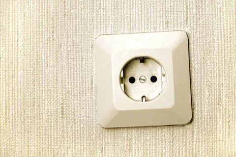 Electric socket on wall close-up of electric socket on wall Copyright: xZo... Stock Photos