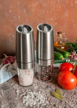 Electric spice mills. With Himalayan salt and pepper. Stand on the table. Nea Stock Photos