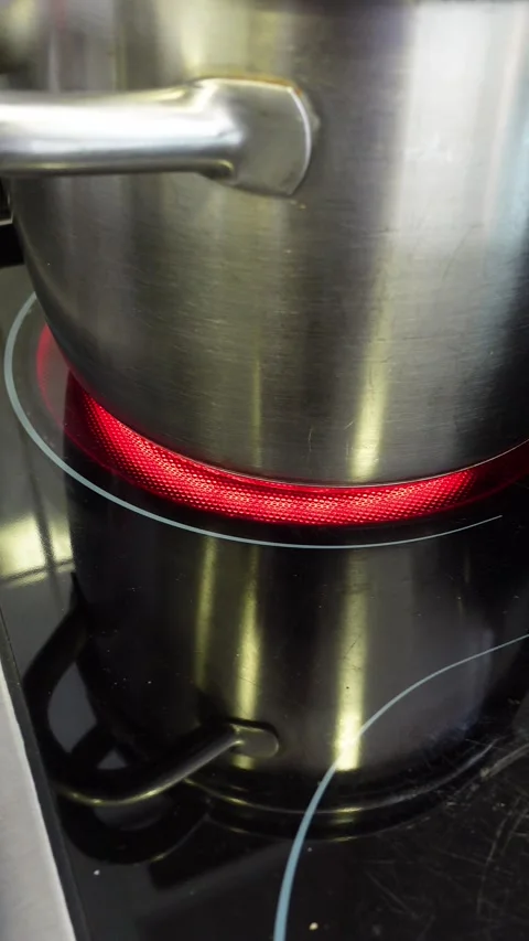 Electric stove being turned on Stock Footage 283865663