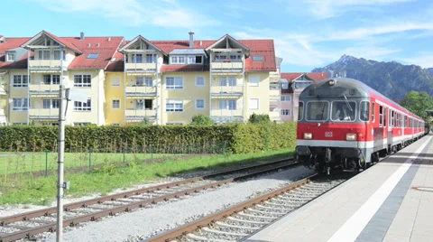 Electric subway train moving from the main train station of Fussen, Germany Stock Footage 32282721