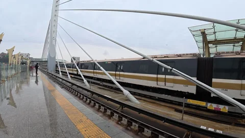 Electric subway train at station showcasing modern public transport Stock Footage 327560035