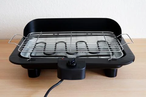 Electric table grill in kitchen Stock Photos