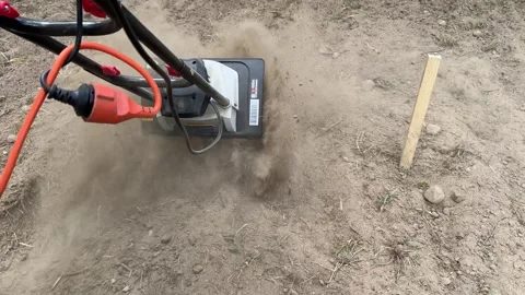 Electric Tiller in Action: Preparing Soil for Vegetables Video stock 278149589